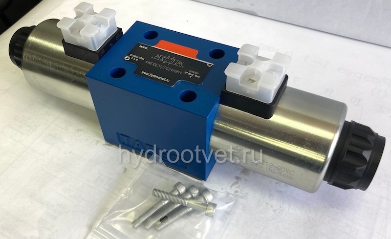 4WE10U31/CG24N9K4 - Гидрораспределитель золотниковый Ду 10 с электроуправлением G24, схема U (134), возврат - пружинный