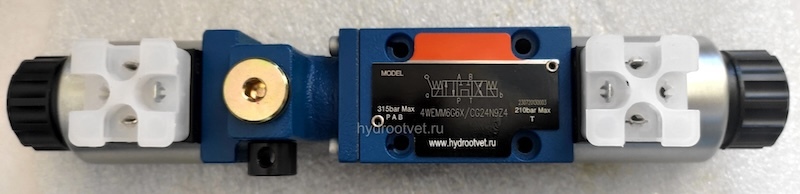 4WEMM6H6X/CG24N9Z4 - Гидрораспределитель золотниковый Ду6 с электрическим и ручным управлением от рычага, схема H (14), электроуправление G24, возврат - пружинный