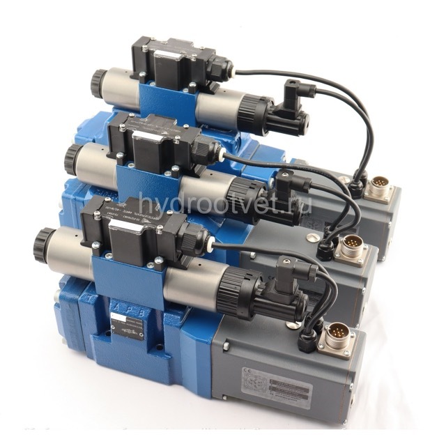 4WRTE10V100L-4X/6EG24ETK31/A1M - Пропорциональный быстродействующий распределитель с обратной связью по положению золотника и со встроенным усилителем (OBE), Ду10, A1 = ±10 В, номинальный расход 100 л/мин, схема V, каналы управления ET = X и Y - внутренни