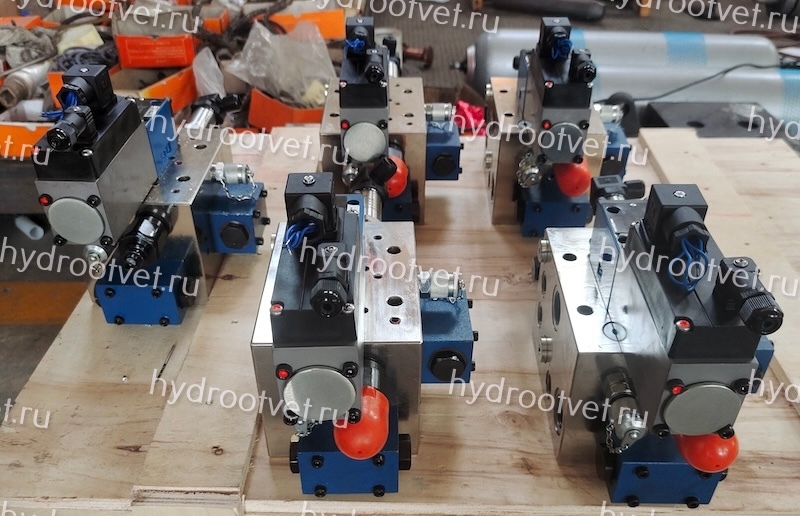 4WRPH6C4B40P–2X/G24Z4/M - Сервораспределитель Ду6 с обратной связью по положению золотника без усилителя, номинальный расход 40 л/мин, характеристика P - прогрессивная, схема C4