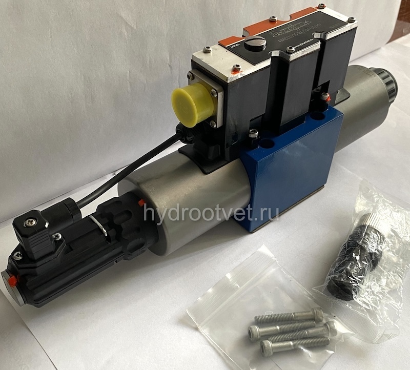 4WREE10W1-50-2X/G24K31/A1V - Пропорциональный распределитель с обратной связью по положению золотника со встроенным усилителем Ду10, A1 = ±10 В, номинальный расход 50 л/мин, схема W1-