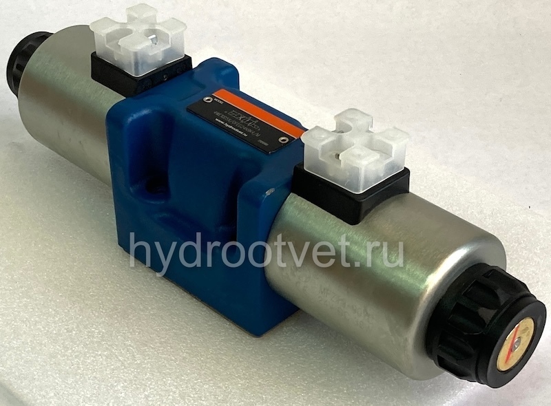 4WE10D5X/OFEG24N9K4/M - Гидрораспределитель золотниковый Ду 10 (серия 5X) с электроуправлением G24, схема D (574А/ОФ), возврат - OF = без пружины, с фиксатором