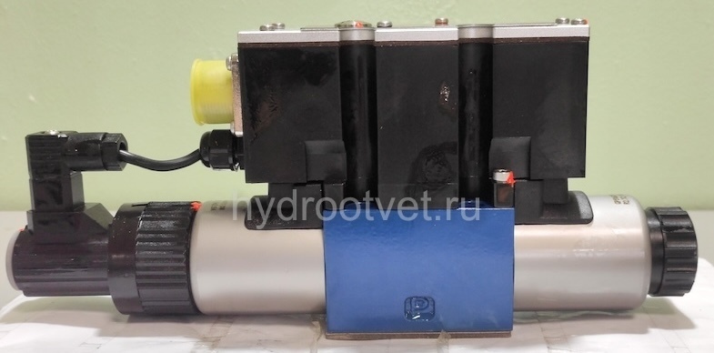4WREE6E08-2X/G24K31/A1V - Пропорциональный распределитель с обратной связью по положению золотника со встроенным усилителем Ду6, A1 = ±10 В, номинальный расход 8 л/мин, схема E