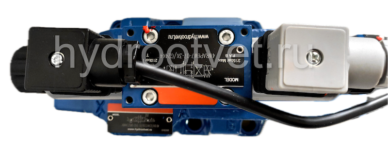 4WRKE25E350L-3X/6EG24ETK31/A1D3M - Пропорциональный распределитель с обратной связью по положению золотника и со встроенным усилителем (OBE), Ду25, A1 = ±10 В, номинальный расход 350 л/мин, схема E, каналы управления ET = X и Y - внутренние