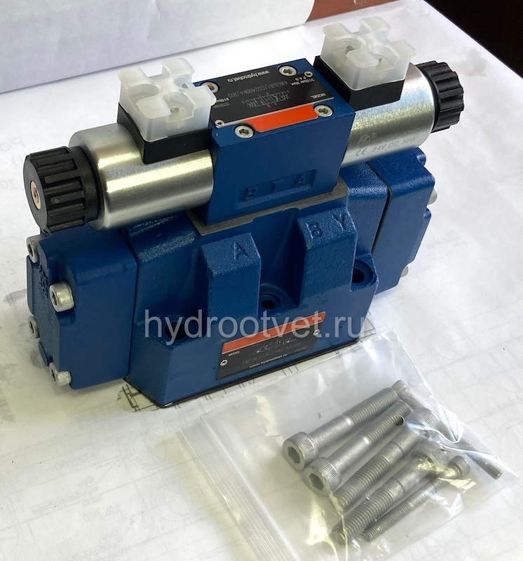 4WEH16E7X/6EG24N9ETK4/B10 - Гидрораспределитель с электроуправлением Ду16 схема E (44), напряжение G24, каналы управления ET - X и Y - внутренние