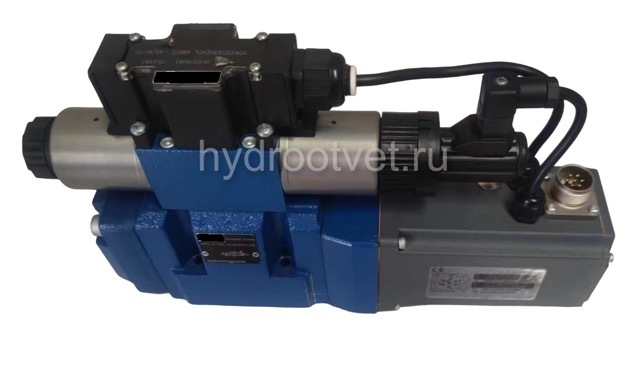 4WRTE10V100L-4X/6EG24ETK31/A1M - Пропорциональный быстродействующий распределитель с обратной связью по положению золотника и со встроенным усилителем (OBE), Ду10, A1 = ±10 В, номинальный расход 100 л/мин, схема V, каналы управления ET = X и Y - внутренни